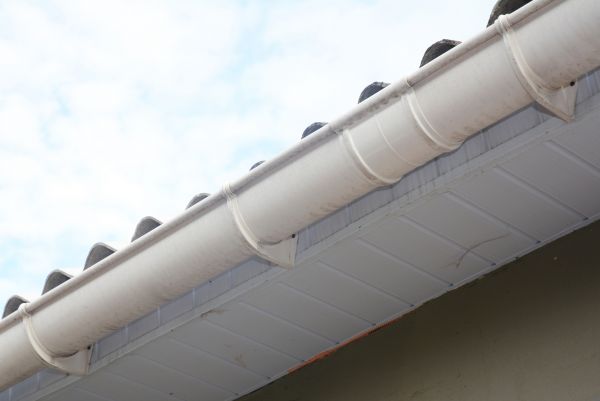 Plastic Gutter Installation in Rogers